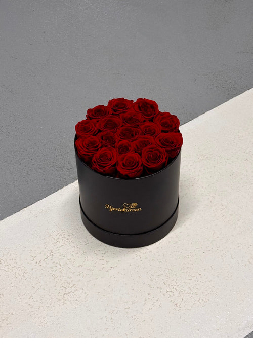 Rundboks med 17 røde roser