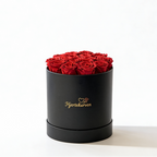 Rundboks med 17 røde roser